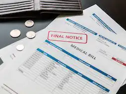 Medical bill from the hospital, concept of rising medical cost, selective focus.  All data on the bill and form design are fictional, created specially for this concept.