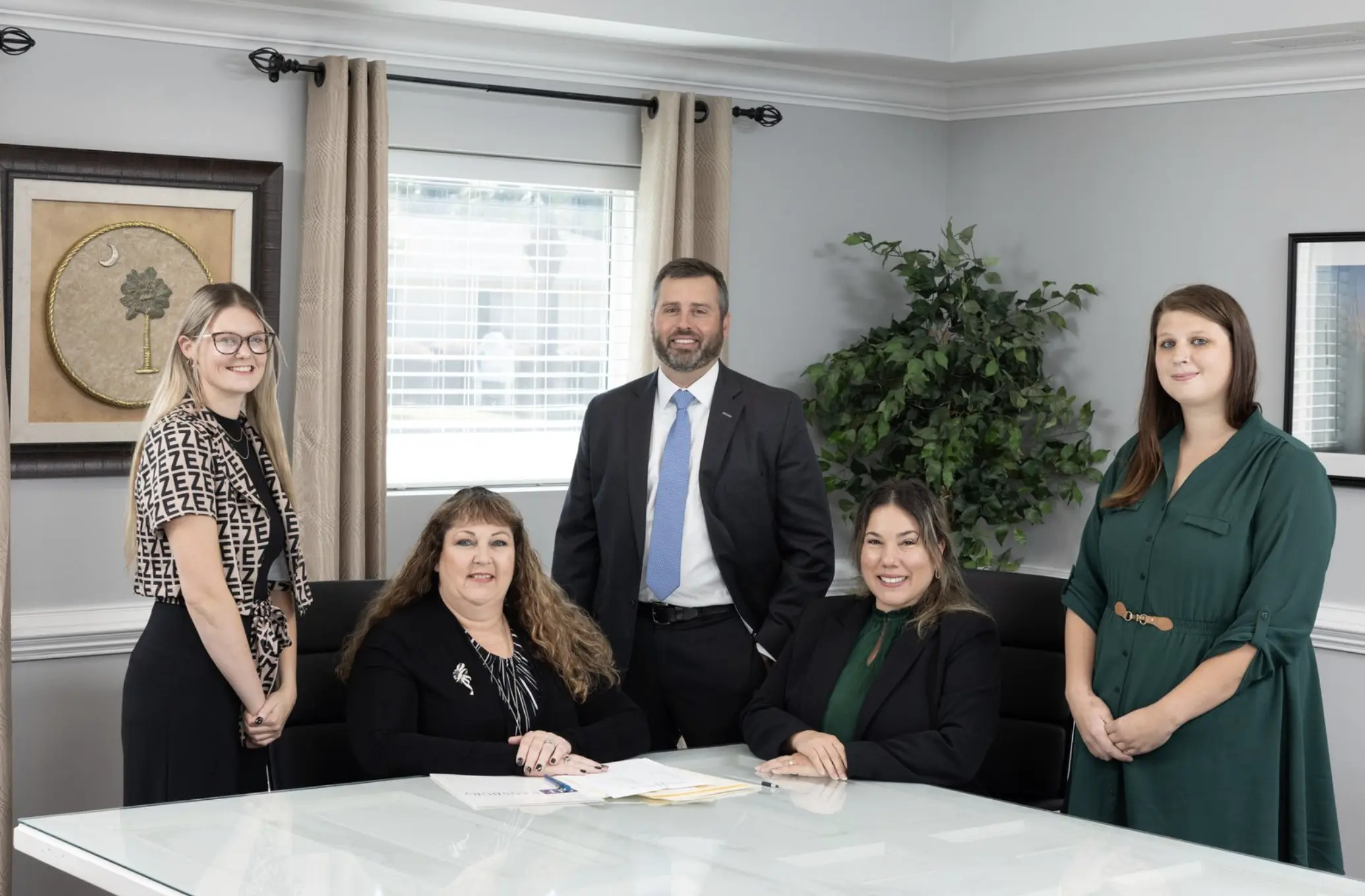 Sansbury Law Firm in Loris SC Five people in a professional office representing Personal Injury Attorney in Loris, SC